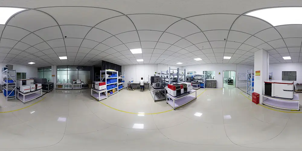 A wide-angle panoramic view of Macylab's professional laboratory and production facility, featuring various analytical instruments, spectrometers, and testing stations.
